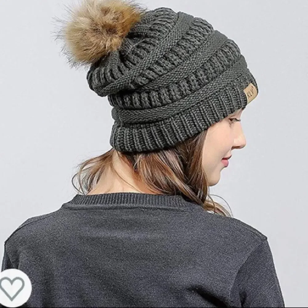 klv Gray knit style beanie with faux fur Pom.